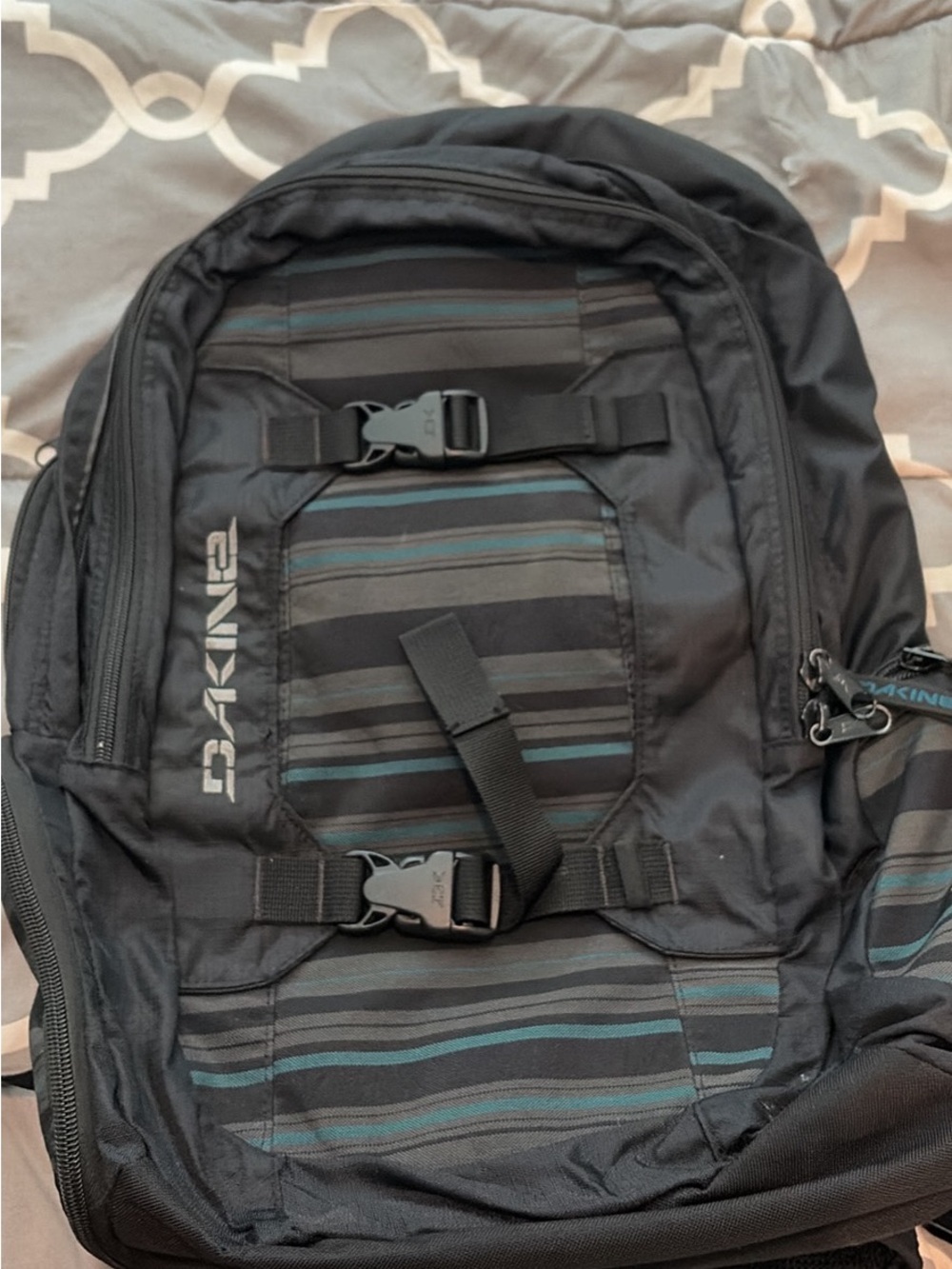 Dakine Black Backpack with Teal and Gray Stripes
